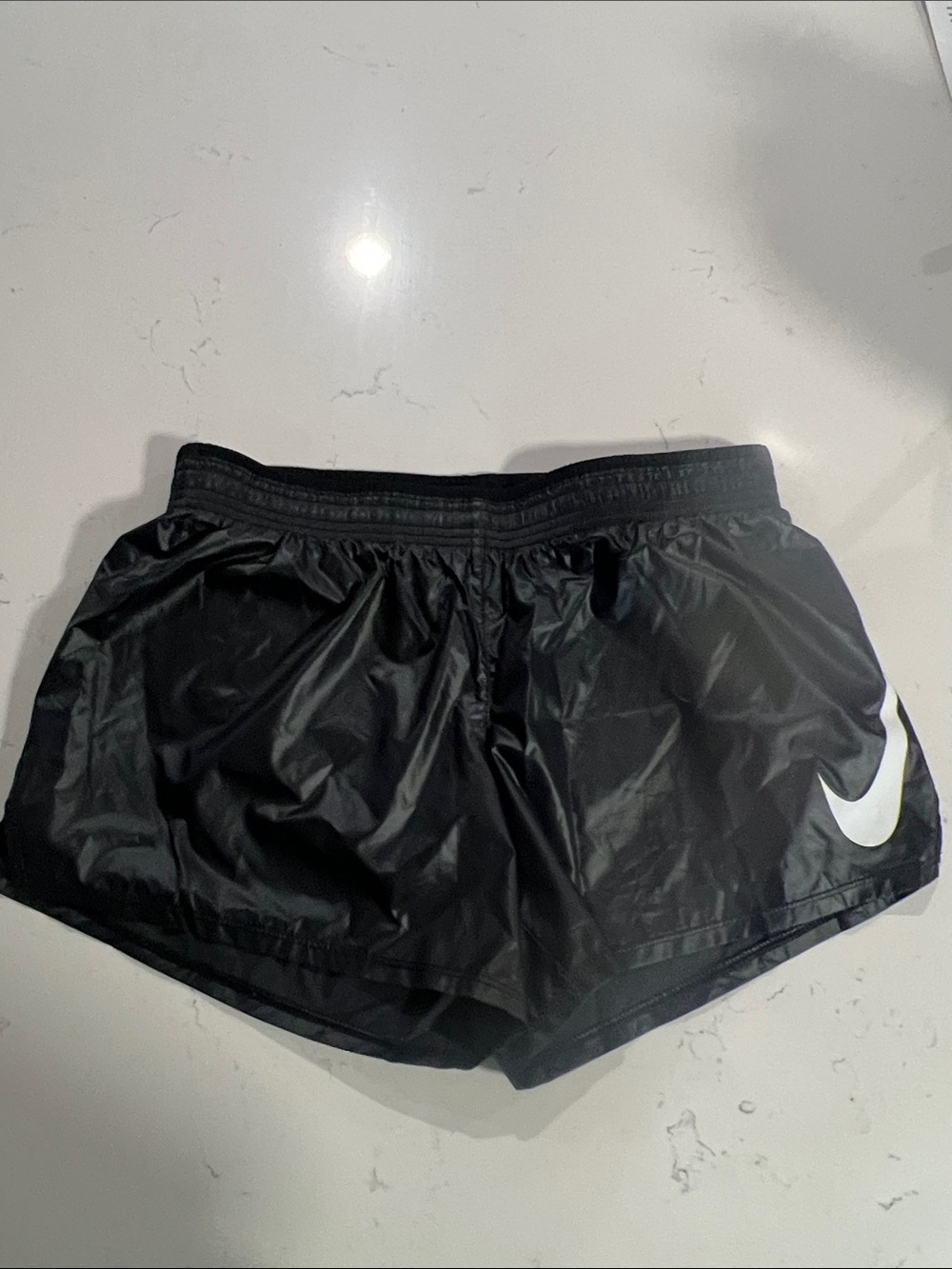Nike Black Women’s Athletic Shorts with White Swoosh